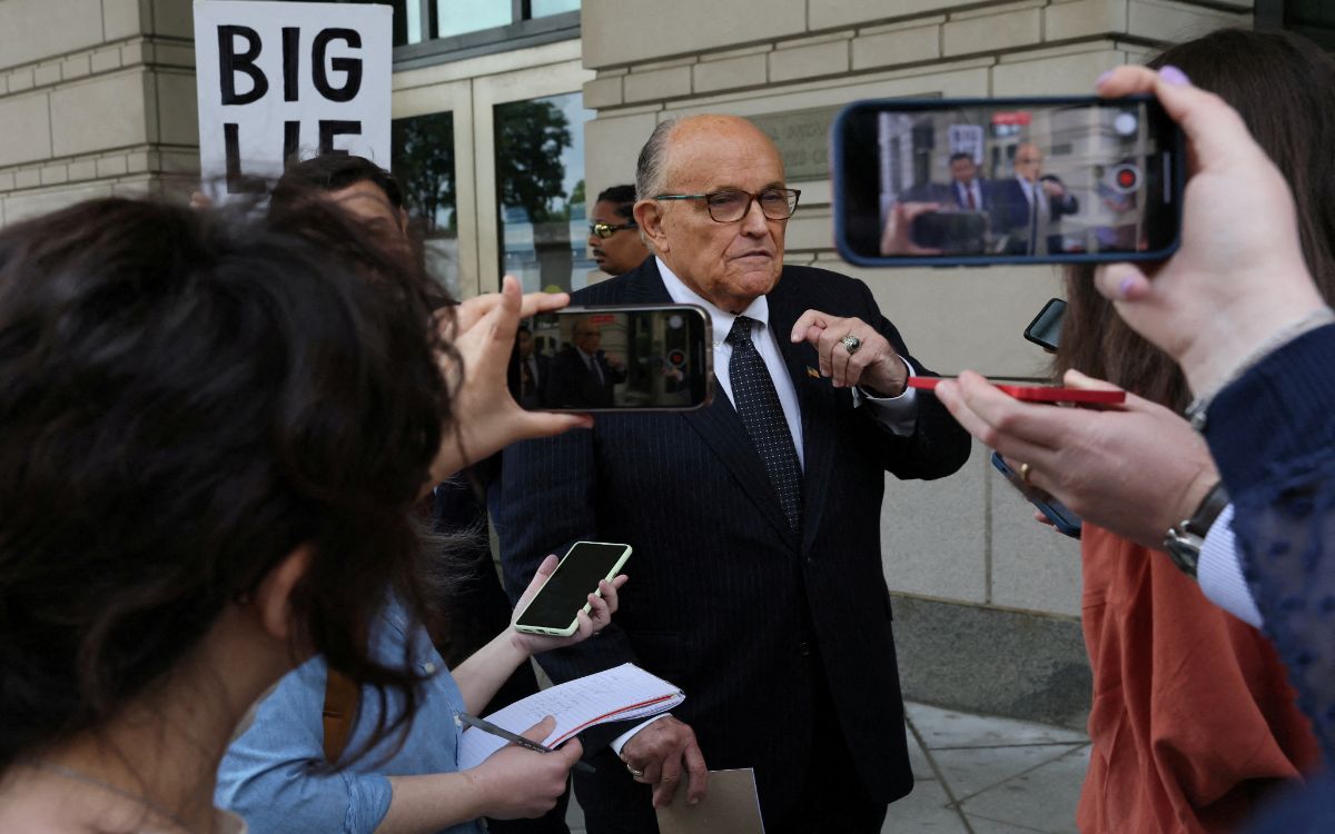 Rudy Giuliani, indicted along with Trump, surrenders to Georgia authorities
