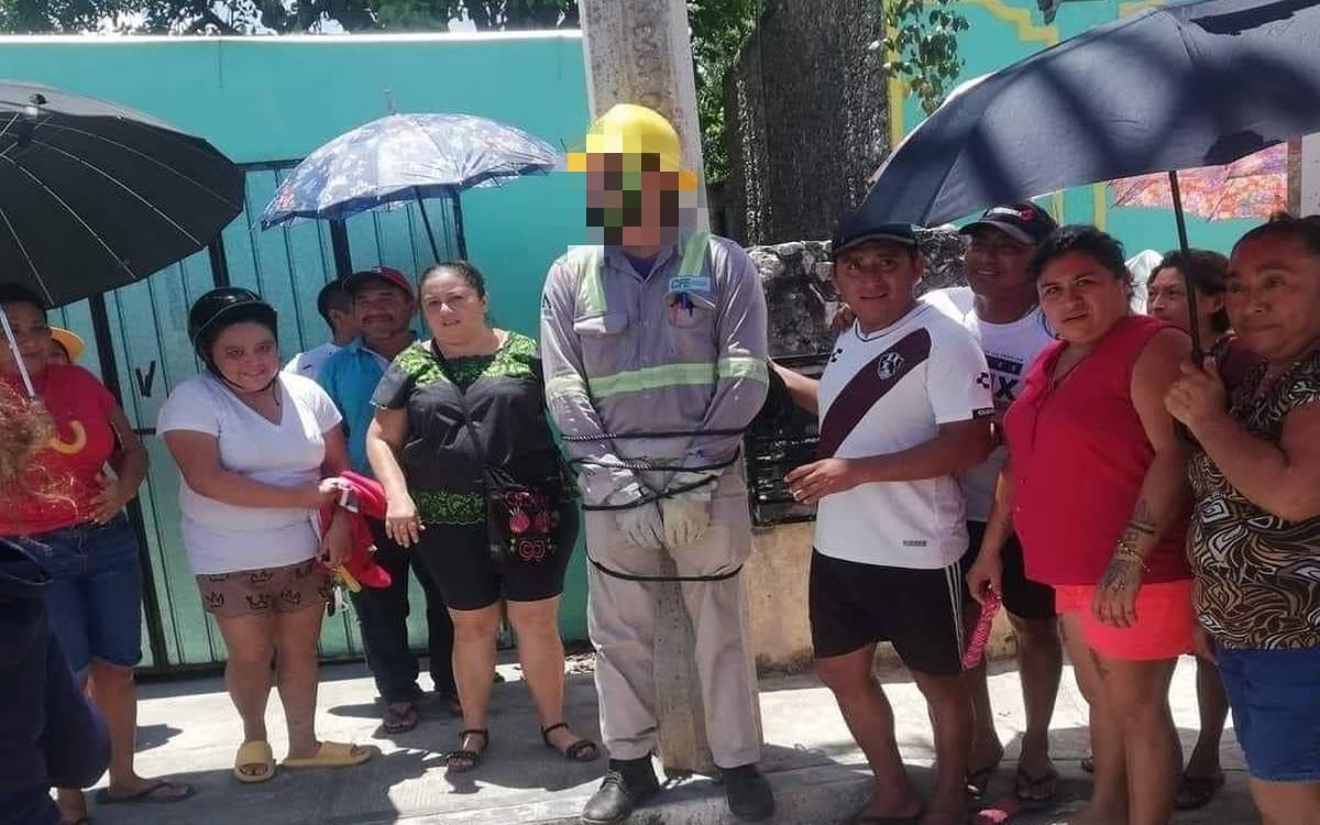 Amarran a un poste a trabajador de la CFE por