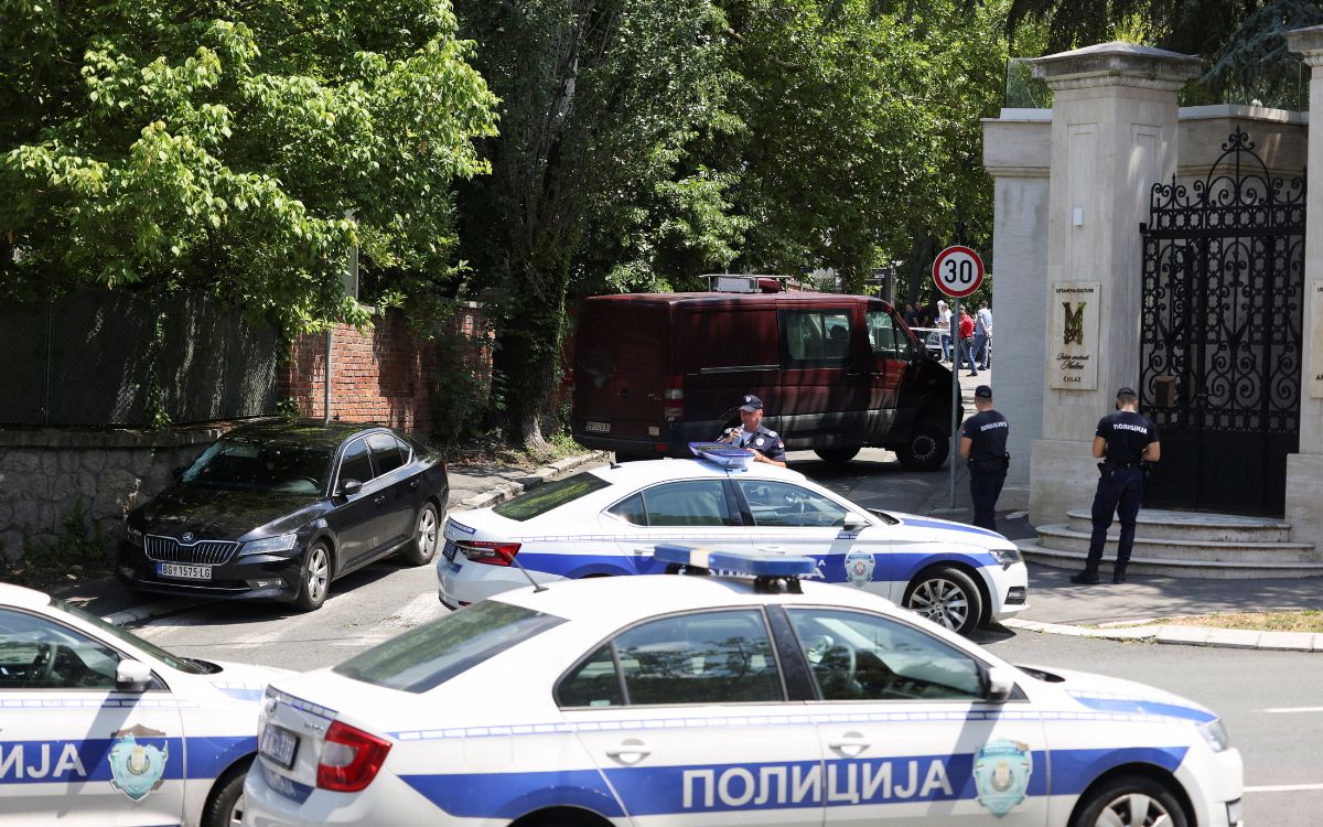 A man is shot dead after attacking a police officer with a crossbow outside the Israeli embassy in Belgrade.