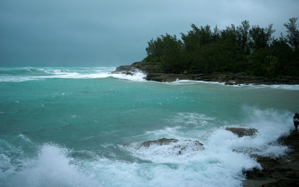 Storm Ernesto becomes a hurricane again and a warning is issued for dangerous currents