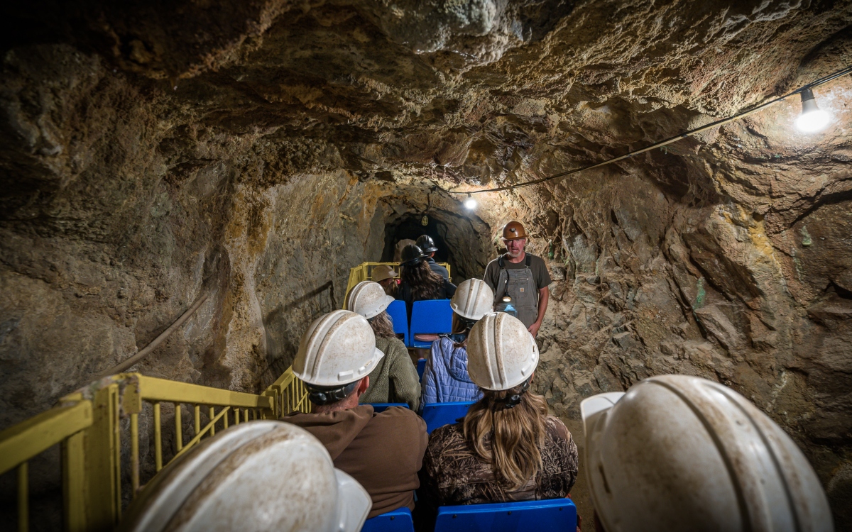 One person is killed when an elevator fails at a tourist mine in the US; 12 trapped people rescued