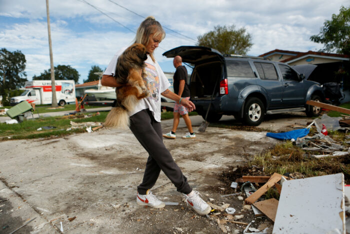 Sandra White prepares to evacuate her home with her partner Scott Pepperman and dog Bui ahead of Hurricane Milton's arrival in New Port Richey, Florida, USA. Photo: Reuters